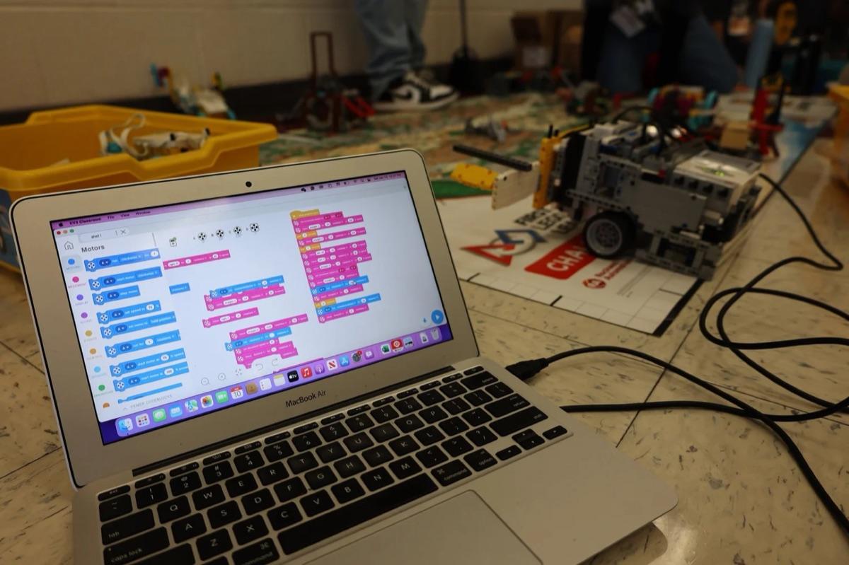 Students programming their FIRST LEGO League robot
