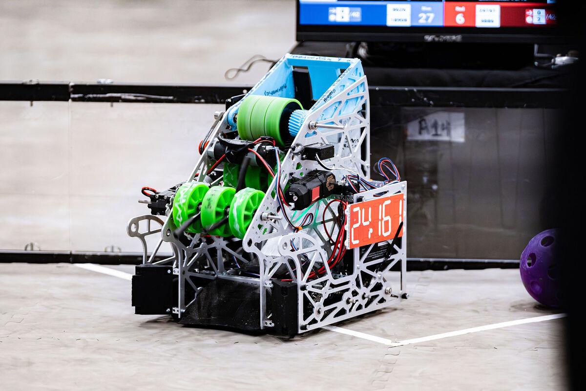 A FIRST Tech Challenge robot with green wheels